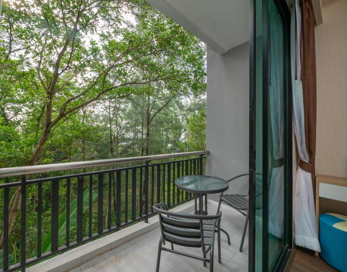 Naithon Beachfront Condotel Esterno foto