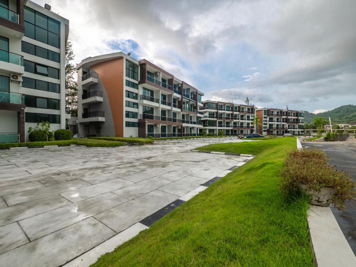 Naithon Beachfront Condotel Esterno foto