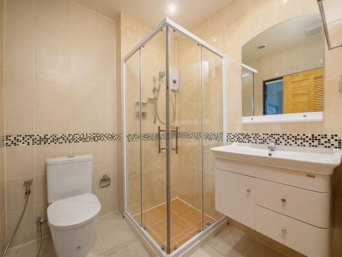 Naithon Beachfront Condotel Esterno foto