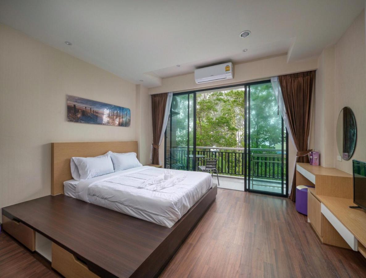 Naithon Beachfront Condotel Esterno foto